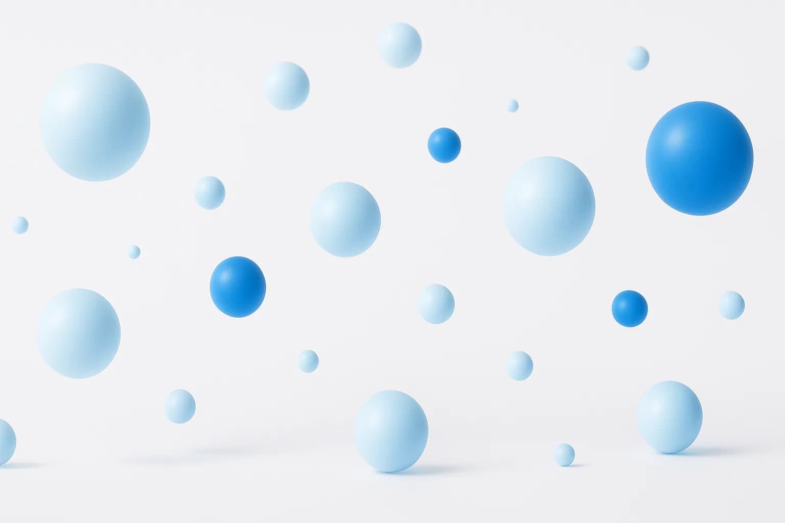 Soft blue spheres drifting on a white field