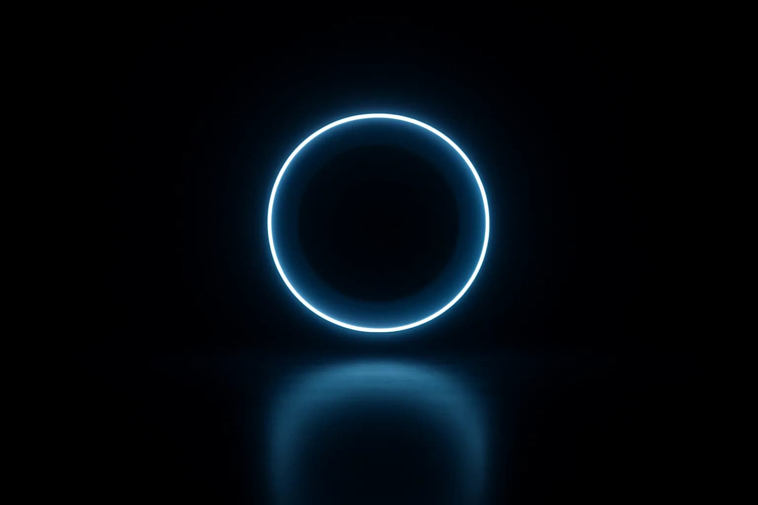 A circular blue ring emblem on white