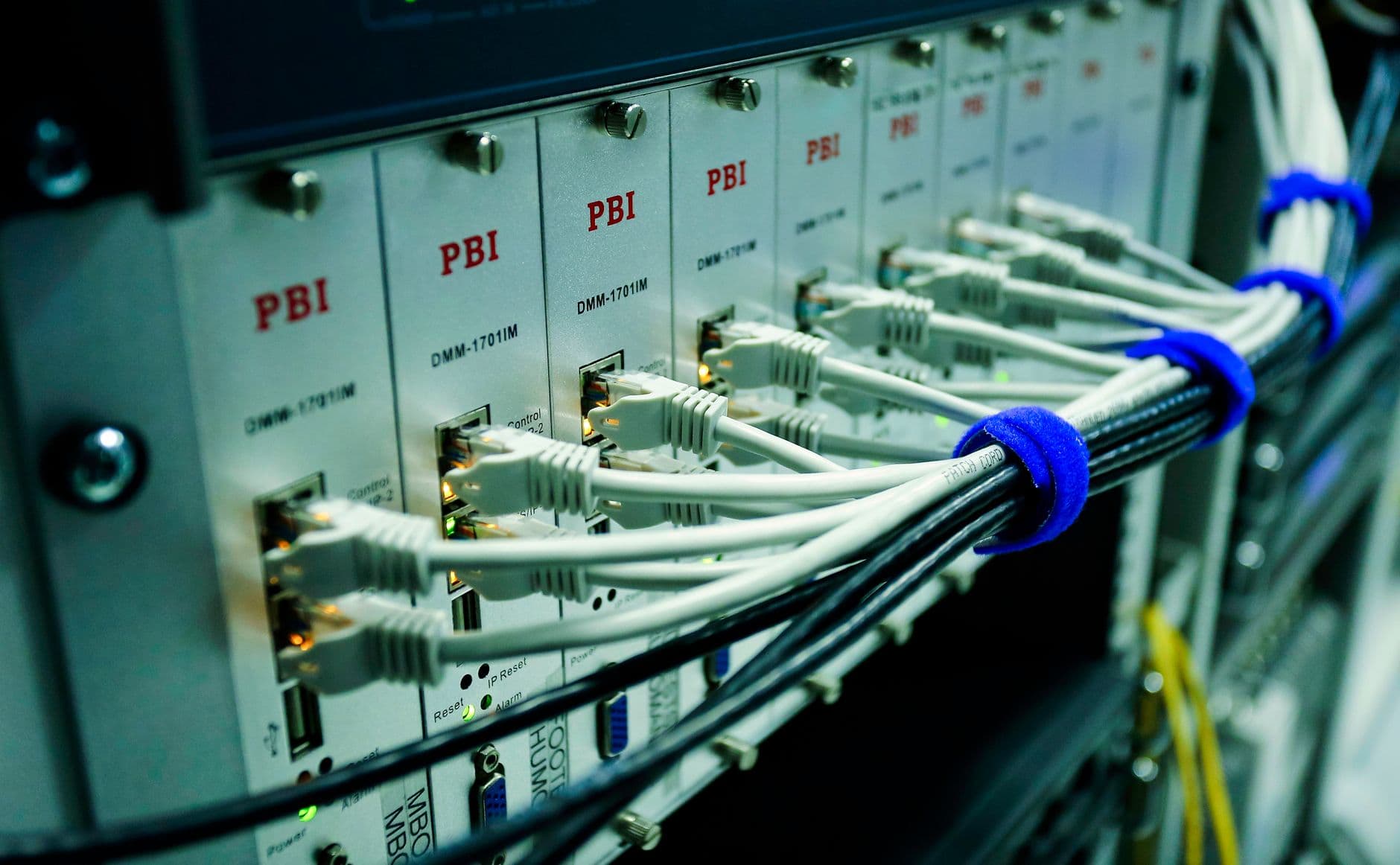 Dedicated server hardware bolted into a rack, seen up close
