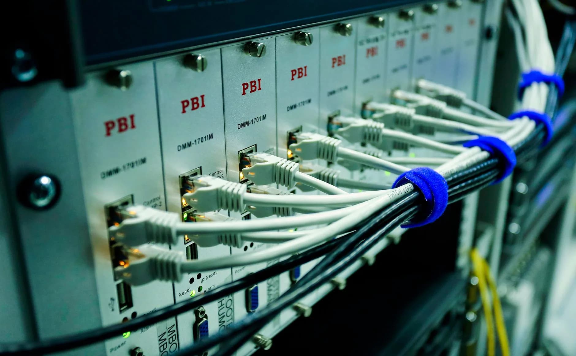 Dedicated server hardware bolted into a rack, seen up close
