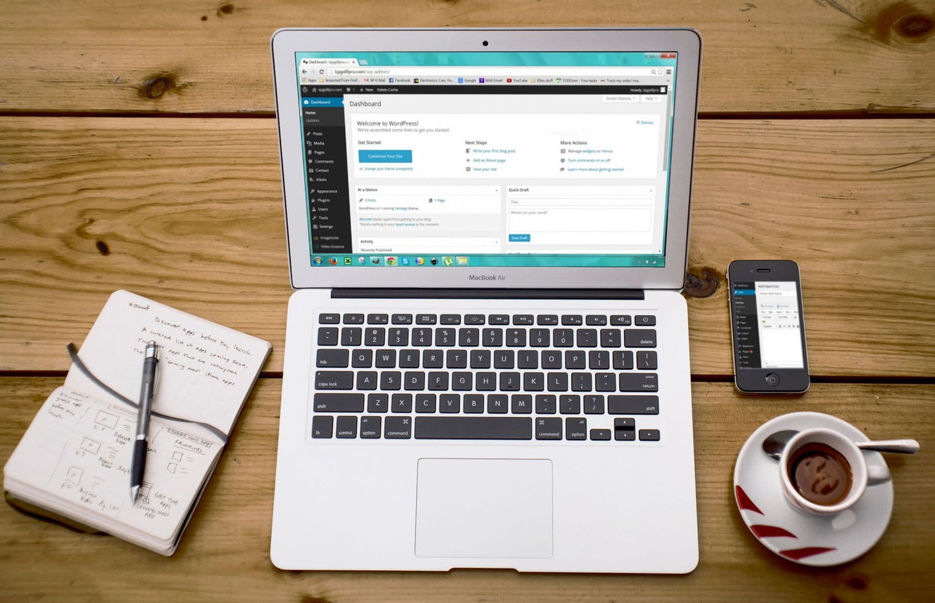 A WordPress site being laid out on a laptop screen